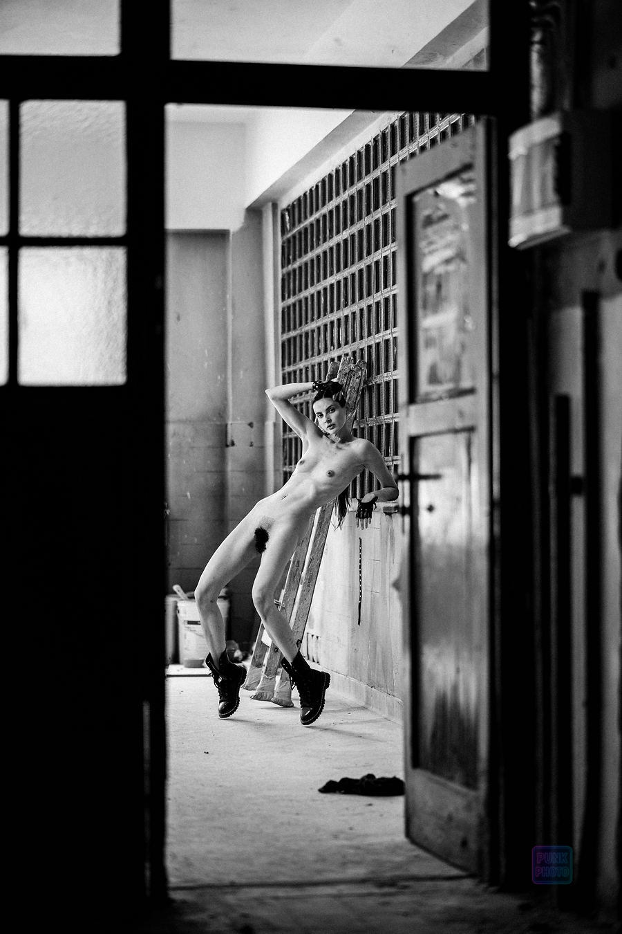 Female model in an industrial interior, fine art photography.