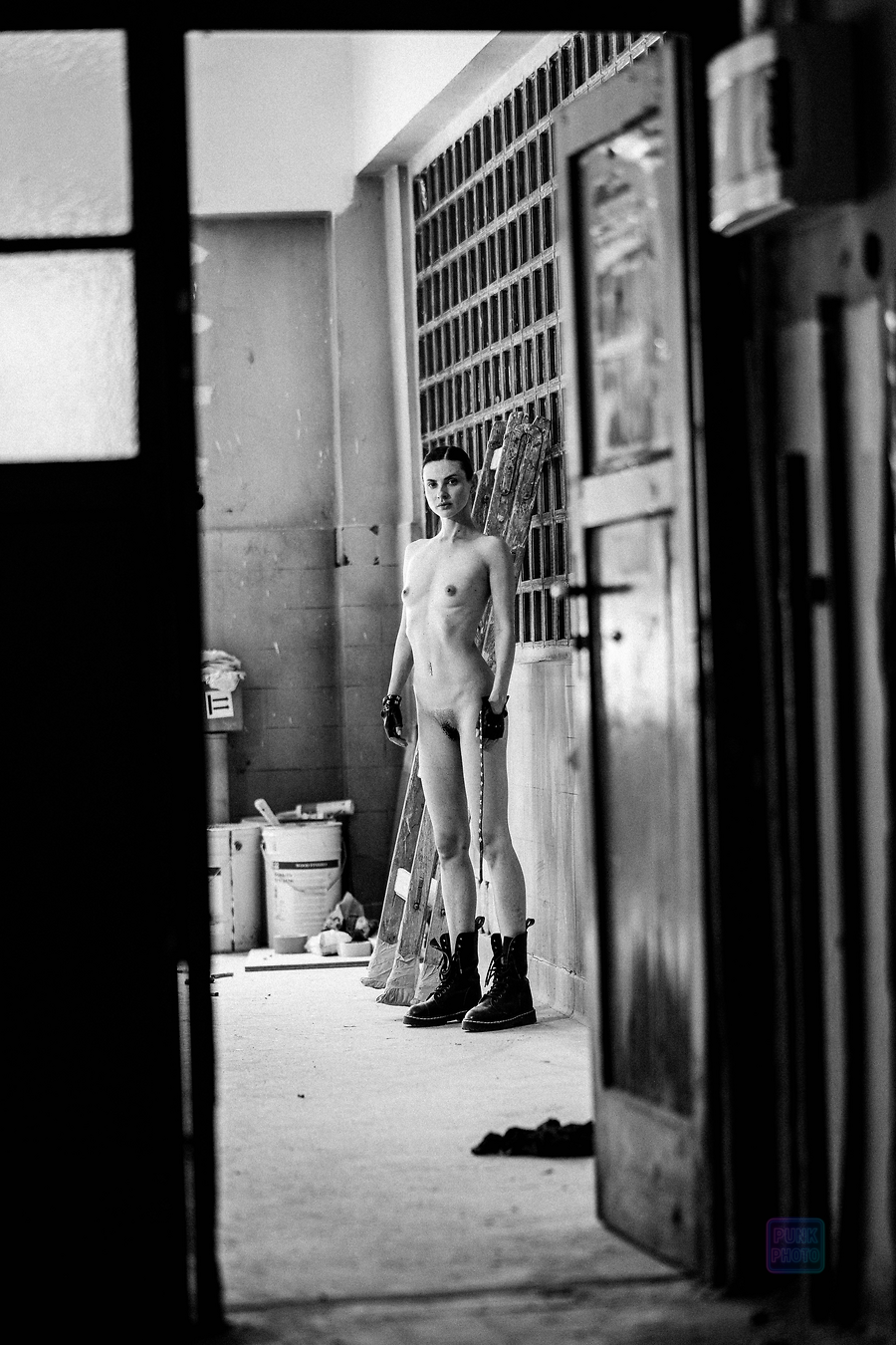 Female model in an industrial interior, fine art photography.